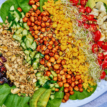 Crumbled Tofu and Smoky Chickpea Chopped Salad with Date Vinaigrette