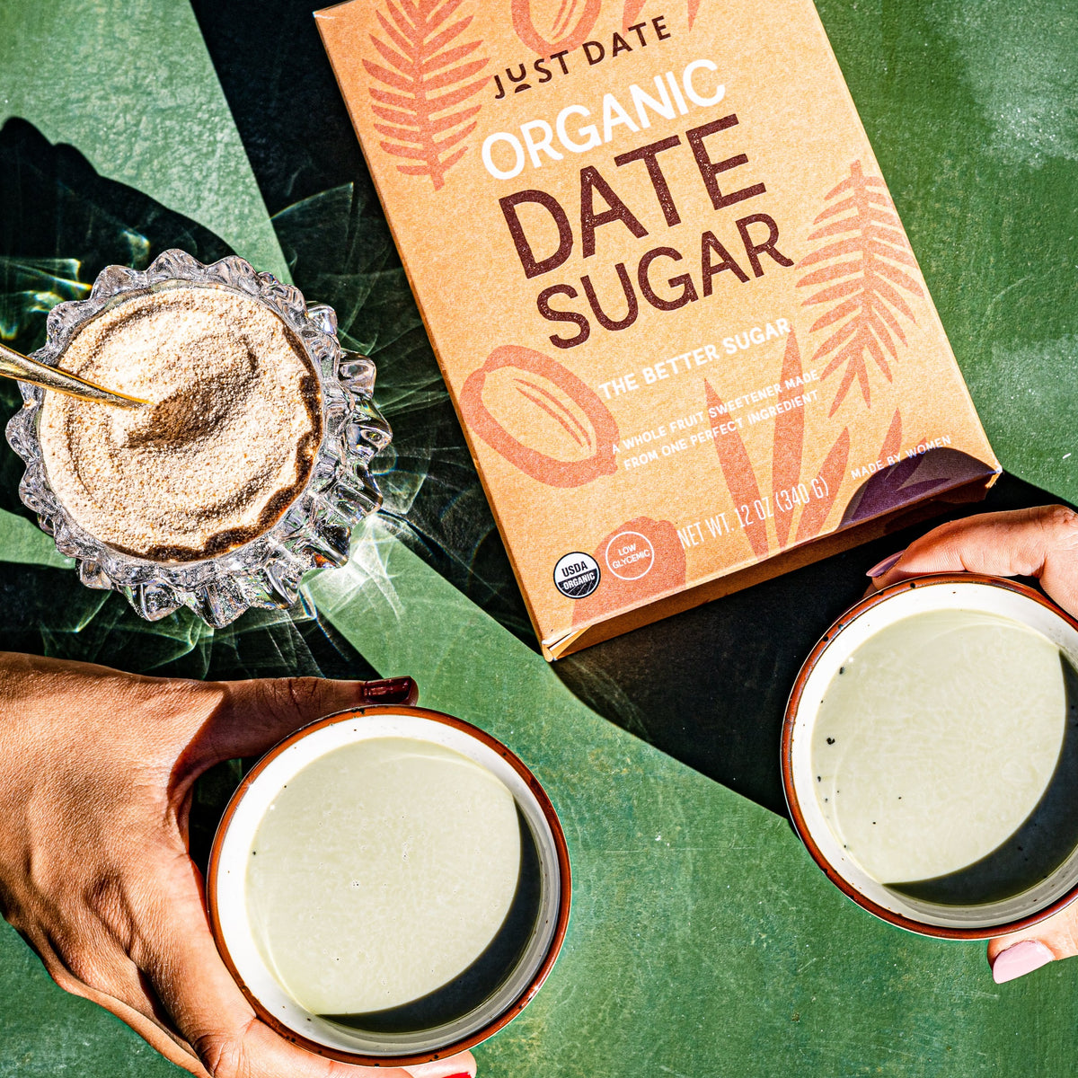 Organic date sugar package with drinks and date sugar powder on a table